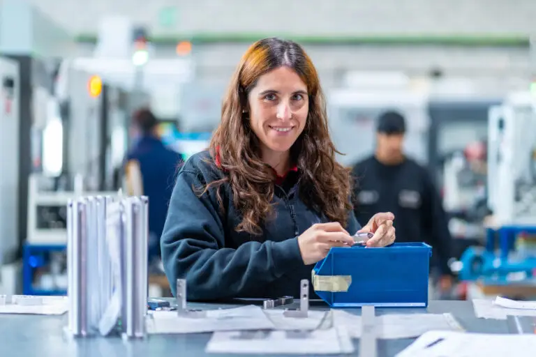 Female engineer working in a cnc factory